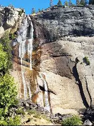 Backpack and Hike at Mist Trail near Yosemite National Park. Maps, directions, and reviews. The mist trail is a small breakoff from the John Muir Trail through Yosemite National Park. It's called the mist trail because of the... (image: Nevada Falls)