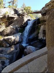 Backpack and Hike at Mist Trail near Yosemite National Park. Maps, directions, and reviews. The mist trail is a small breakoff from the John Muir Trail through Yosemite National Park. It's called the mist trail because of the... (image: Waterfall Above Vernal Falls)