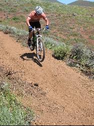 Rider on a bermed descent at Croy Creek. BLM photo, public domain. courtesy of BLMIdaho&nearr; (Public domain&nearr;)