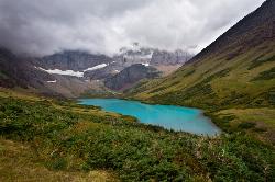 Backpack, Camp, and Hike at Cracker Lake Trail near Many Glacier, Glacier National Park. Maps, directions, and reviews. What impresses people most about this lake is the surreal turquoise color of the lake. Regardless of the... (image: Cracker Lake courtesy of Jeff P↗)