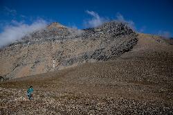 Hiker at Siyeh Pass courtesy of Glacier National Park / NPS&nearr; (Public Domain&nearr;)