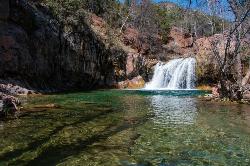 Hike and Swim at Fossil Creek Waterfall near Pine, Arizona. Maps, directions, and reviews. Fossil Creek is one of Arizona's two designated "Wild and Scenic" rivers. The waterfall is the most popular place to visit... (image: Waterfall Trail at Fossil Creek courtesy of Deborah Lee Soltesz of Coconino National Forest↗)