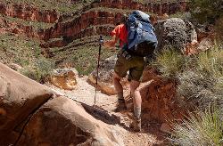 Climbing boulders on the Boucher Trail courtesy of Grand Canyon Association↗
