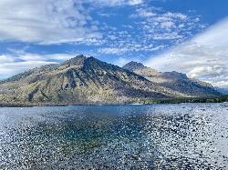 The still surface of Lake McDonald courtesy of w_lemay&nearr; (CC BY-SA 2.0&nearr;)