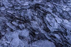 Winter ice on Lake McDonald courtesy of GlacierNPS&nearr; (Public domain&nearr;)