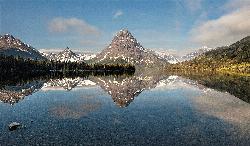 Two Medicine Lake beneath the peaks courtesy of GlacierNPS&nearr; (Public domain&nearr;)