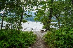 St. Mary Lake shoreline at Rising Sun courtesy of GlacierNPS&nearr; (Public domain&nearr;)