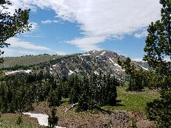 Hike at Mount Jefferson near Island Park, Idaho. Maps, directions, and reviews. Mount Jefferson, at 10, 203 feet is the highest point in the Centennial Mountains, a small, local range on the border of Idaho and Montana a little... (image: First Look at the Summit courtesy of endovereric↗)