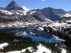 Hike at Hidden Lake near Glacier National Park. Maps, directions, and reviews. The Hidden Lake Trail in Glacier National Park is a moderate to strenuous hike that offers breathtaking views of the surrounding landscape. Located in... (image: Hidden Lake from Overlook With Snow courtesy of Mark Wagner↗)