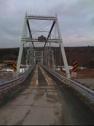 Looking along the deck of the old bridge toward the Pennsylvania bank courtesy of Bumppoman (talk).&nearr; (CC BY-SA 3.0&nearr;)