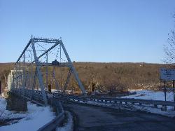 The approach to the Skinners Falls-Milanville bridge in winter courtesy of Doug Kerr from now in Binghamton, NY&nearr; (CC BY-SA 2.0&nearr;)