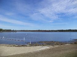 Looking northeast across the swim area toward the far shore courtesy of Michael Rivera&nearr; (CC BY-SA 3.0&nearr;)