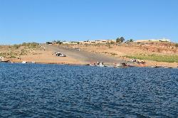 The wide concrete launch ramp at Wahweap seen from the water at low lake level courtesy of NPS&nearr; (Public domain&nearr;)