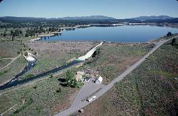 The spillway channel and the Little Truckee River below the dam, with Interstate 80 beyond courtesy of U.S. Bureau of Reclamation, photographer not specified or not known&nearr; (Public domain&nearr;)
