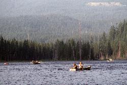 Boating on Trillium Lake below Mount Hood courtesy of U.S. Forest Service- Pacific Northwest Region&nearr; (Public domain&nearr;)