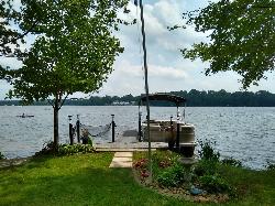 Summer water and shoreline at Guilford Lake courtesy of j33pman&nearr; (CC BY-SA 2.0&nearr;)