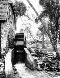 The millhouse and waterwheel photographed by the Forest Service in 1937, looking toward the bathhous