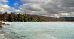 Parker Lake frozen over in March. The 20 acre lake draws ice fishing and skating once the beach seas courtesy of Nicholas A. Tonelli from Northeast Pennsylvania, USA&nearr; (CC BY 2.0&nearr;)