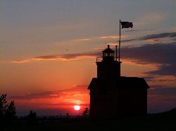 Sunset over the channel and Big Red seen from the park shoreline courtesy of LadyDragonflyCC - >;