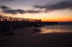 Long exposure of Lake Michigan surf breaking on the park shoreline courtesy of Kirsten&nearr; (CC BY-SA 2.0&nearr;)