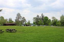 The Day Use Picnic Area lawn, pavilion and shower house above the main beach courtesy of Yinan Chen&nearr; (Public Domain&nearr;)