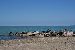 One of the offshore rubble breakwaters off Presque Isle, posted off limits courtesy of kezee&nearr; (CC BY 2.0&nearr;)