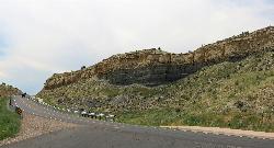 Banded Cretaceous rock layers exposed along Juniper Road in Lake Pueblo State Park. courtesy of Jeffrey Beall&nearr; (CC BY 4.0&nearr;)