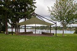 The covered stage on the lawn at Angle Lake Park courtesy of Atomic Taco from Seattle, WA, USA&nearr; (CC BY-SA 2.0&nearr;)