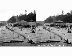 Swimmers at Woodland Park Beach on the west shore of Green Lake around 1922 courtesy of Unknown authorUnknown author&nearr; (Public domain&nearr;)