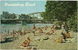 Midcentury postcard of the swimming beach with the Memorial Bridge behind it courtesy of Unknown authorUnknown author&nearr; (Public domain&nearr;)