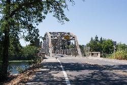 The Memorial Bridge in its river setting at the Veterans Memorial Beach reach courtesy of Frank Schulenburg&nearr; (CC BY-SA 3.0&nearr;)