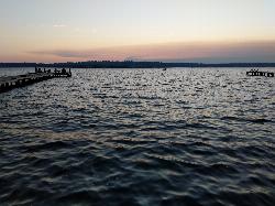 Open water off the end of the Waverly Beach Park dock with a boat passing offshore courtesy of clocky&nearr; (CC BY-SA 4.0&nearr;)
