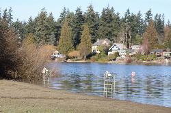 Lifeguard stands at the Steel Lake Park swimming area courtesy of Chris Light&nearr; (CC BY-SA 4.0&nearr;)