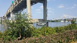 Looking upstream from the beach at the Marquam Bridge deck and piers courtesy of Another Believer&nearr; (CC BY-SA 4.0&nearr;)