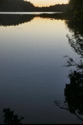 Cascade Lake at dusk from a campsite above the water courtesy of LittleRoamingChief&nearr; (CC BY 2.0&nearr;)