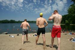 Swimmers at a Cedar Lake beach in June, inside the buoy line. courtesy of gomattolson from Minneapolis&nearr; (CC BY-SA 2.0&nearr;)