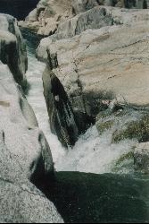 The Rubicon River dropping through a granite cataract on its way into the reservoir, May 2005. courtesy of Marcia Wright&nearr; (CC BY 3.0&nearr;)