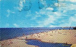 A 1968 postcard of the beach packed with swimmers, with the harbor breakwall on the horizon courtesy of Ashtabula Archive&nearr; (Public domain&nearr;)