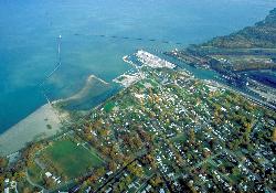 Aerial view with the park beach at lower left, the sandbar, and Conneaut Harbor beyond courtesy of Ken Winters, U.S. Army Corps of Engineers&nearr; (Public domain&nearr;)