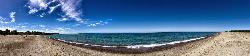 The shoreline in midsummer, looking out over the swimming area courtesy of Michael A. Orlando&nearr; (CC BY-SA 3.0&nearr;)