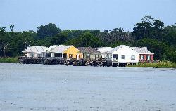 Stilted park cabins standing over the water along the Fontainebleau shoreline courtesy of Mark Holloway&nearr; (CC BY 2.0&nearr;)