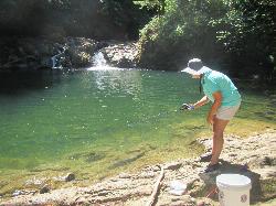 A visitor at the green pool gives a sense of its size. courtesy of Bureau of Land Management Oregon and Washington&nearr; (Public domain&nearr;)