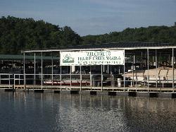 Prairie Creek Marina, the private concession sharing the cove with the swim beach and the five lane  courtesy of Traveler7&nearr; (CC BY-SA 3.0&nearr;)