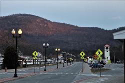 Beach Road, the approach to the day use area entrance, looking toward the lake on a winter evening. courtesy of Tyler A. McNeil&nearr; (CC BY-SA 4.0&nearr;)