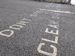 Clean, drain and dry pavement markings at the boat launch beside the beach, where inspection and was courtesy of Edmund Rozell&nearr; (CC BY-SA 4.0&nearr;)