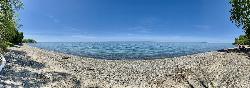 Panorama of the pebble beach and the open lake at Wilson-Tuscarora State Park. courtesy of Andre Carrotflower&nearr; (CC BY-SA 4.0&nearr;)