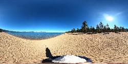 Panorama of the wide sandy beach, the treeline and the lake on a calm August morning. courtesy of G. Edward Johnson&nearr; (CC BY 4.0&nearr;)