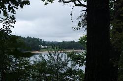Lake James seen through the trees at Paddy's Creek, National Park Service photo. courtesy of NPS Photo&nearr; (Public domain&nearr;)