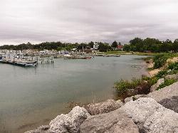 Looking across the harbor basin toward the park lawn and the sand beach on the right courtesy of Ken Lund from Reno, Nevada, USA&nearr; (CC BY-SA 2.0&nearr;)
