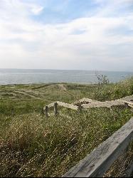 Looking out across Lake Michigan from the shore at New Buffalo courtesy of hakkun&nearr; (CC BY-SA 3.0&nearr;)